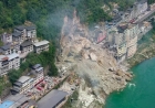DESLIZAMENTO DE TERRA DEIXA 8 MORTOS E 34 DESAPARECIDOS NA CHINA