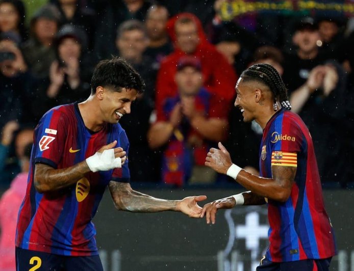 BARCELONA ‘‘DESPACHA’’ RACING COM GOLAÇO DE CANCELO E HAT-TRICK DE RAPHINHA